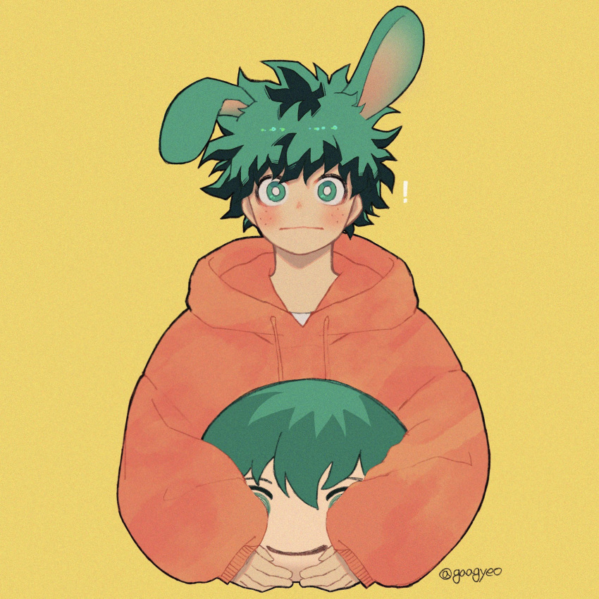 ! 1boy animal_ears artist_name blush boku_no_hero_academia bright_pupils character_doll closed_mouth commentary_request cropped_torso freckles gaagyeo green_eyes green_hair highres holding holding_stuffed_toy hood hood_down hoodie korean_commentary long_sleeves looking_at_viewer male_focus midoriya_izuku orange_hoodie rabbit_ears short_hair simple_background solo stuffed_toy twitter_username upper_body white_pupils yellow_background