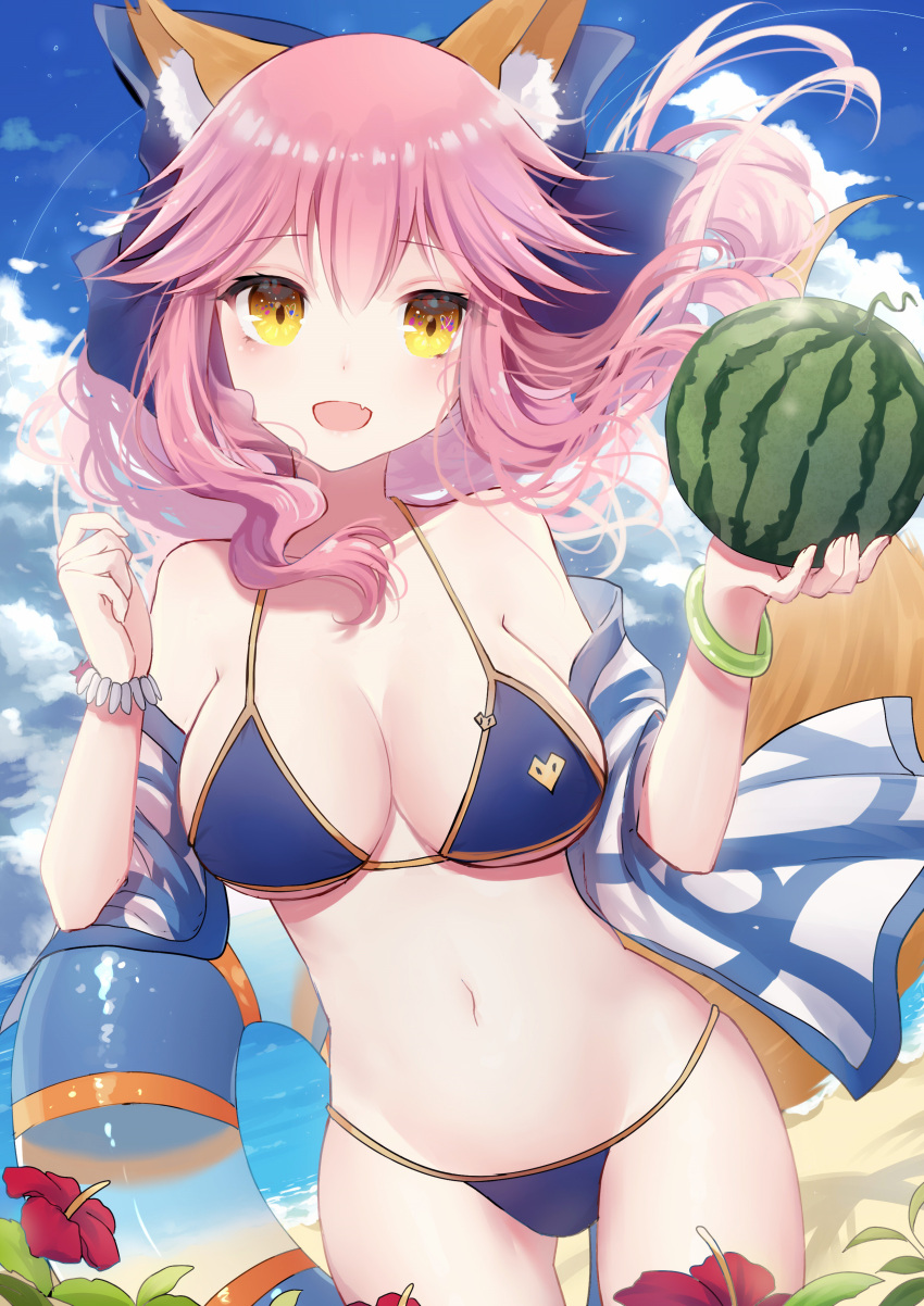 1girl absurdres animal_ears bracelet breasts cleavage eyebrows_visible_through_hair fate/extra fate/grand_order fate_(series) food fox_ears fruit heart highres holding holding_food innertube jewelry large_breasts long_hair looking_at_viewer navel pink_hair saikou-iro_aurora solo tamamo_(fate)_(all) tamamo_no_mae_(swimsuit_lancer)_(fate) towel watermelon yellow_eyes