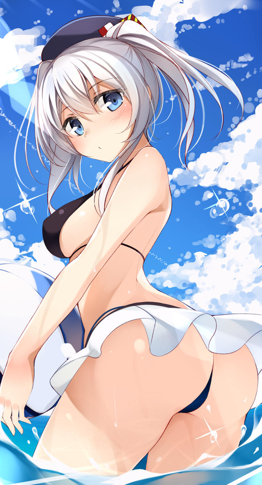 10s 1girl absurdres ass ball bare_arms bare_back bare_shoulders beret bikini bikini_skirt black_bikini black_hat blue_eyes blue_sky blush breasts closed_mouth clouds day eyebrows eyebrows_visible_through_hair from_behind hair_between_eyes hat highres holding holding_ball kantai_collection kashima_(kantai_collection) looking_back medium_breasts netarou ocean sideboob silver_hair sky solo standing swimsuit thighs twintails wading water