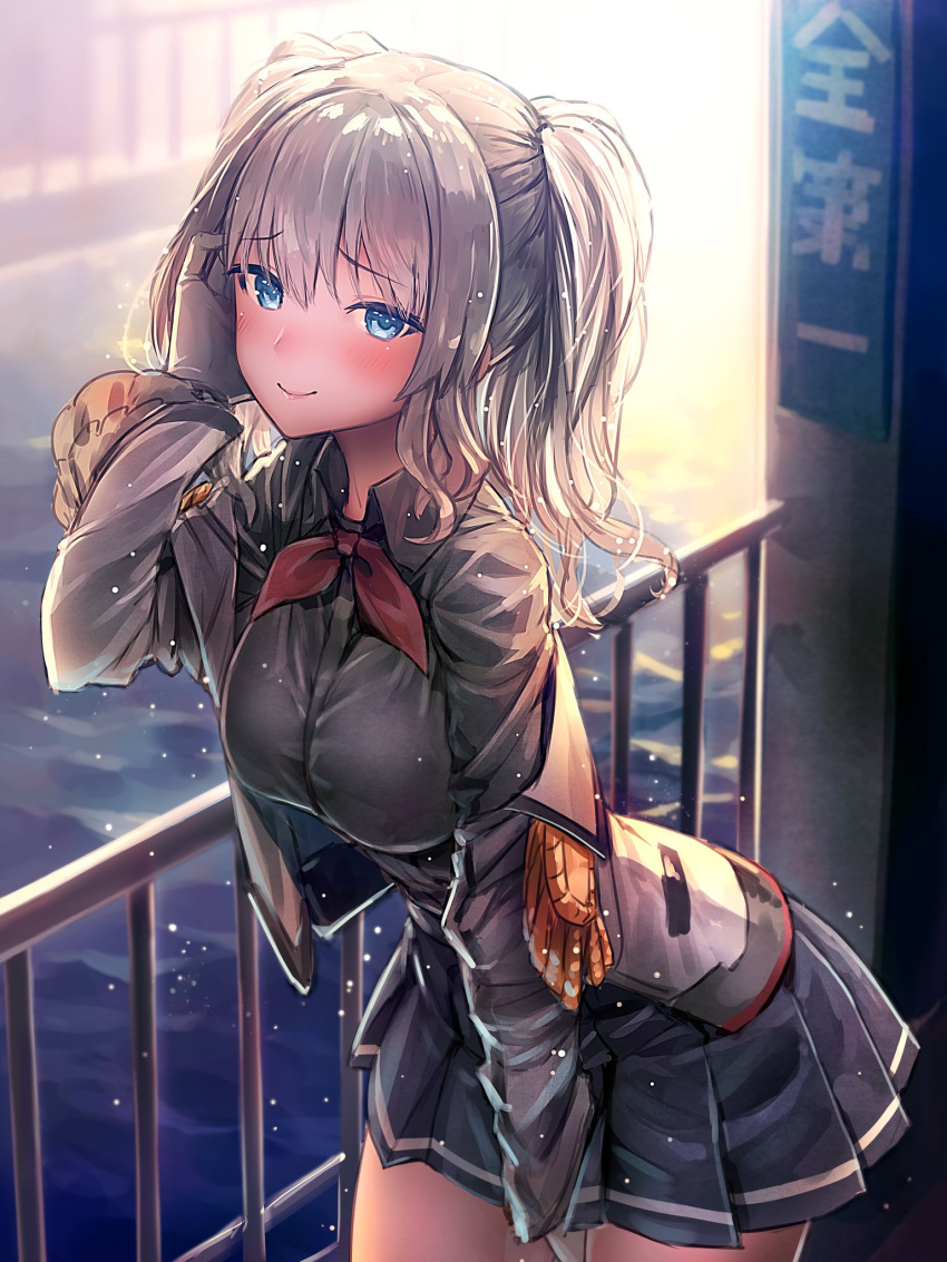 1girl backlighting bangs between_legs blue_eyes blush breasts closed_mouth cowboy_shot epaulettes eyebrows_visible_through_hair gloves hair_tucking hand_between_legs highres kantai_collection kashima_(kantai_collection) kurobuta_gekkan leaning_forward long_sleeves looking_at_viewer medium_breasts off_shoulder outdoors pleated_skirt railing sidelocks silver_hair skirt smile solo twintails white_gloves