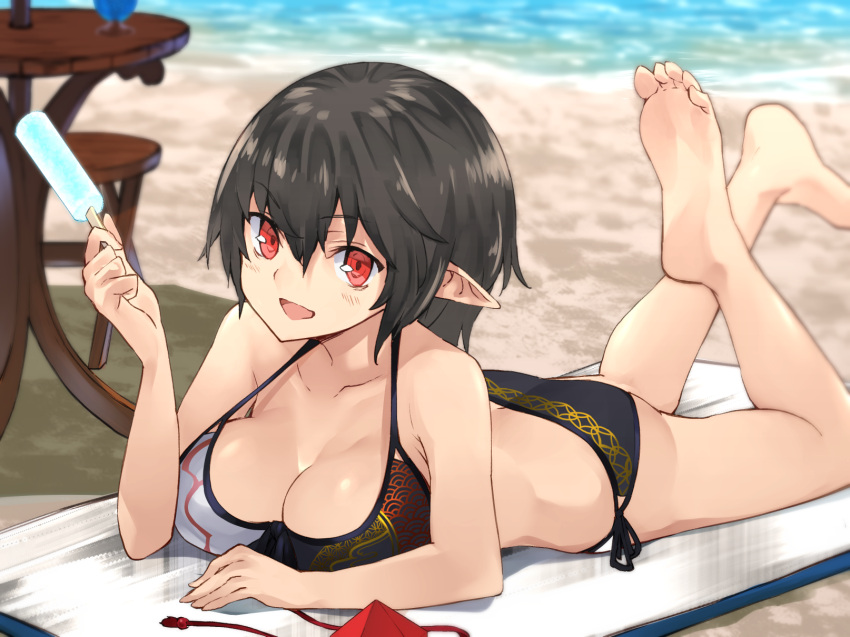 1girl bare_shoulders barefoot beach beach_towel bikini black_bikini breasts chair cleavage day food hair_between_eyes halter_top halterneck hat hat_removed headwear_removed highres holding large_breasts looking_at_viewer lying nuqura on_stomach outdoors pointy_ears popsicle red_eyes sand shameimaru_aya short_hair side-tie_bikini smile solo summer swimsuit table the_pose tokin_hat touhou towel water