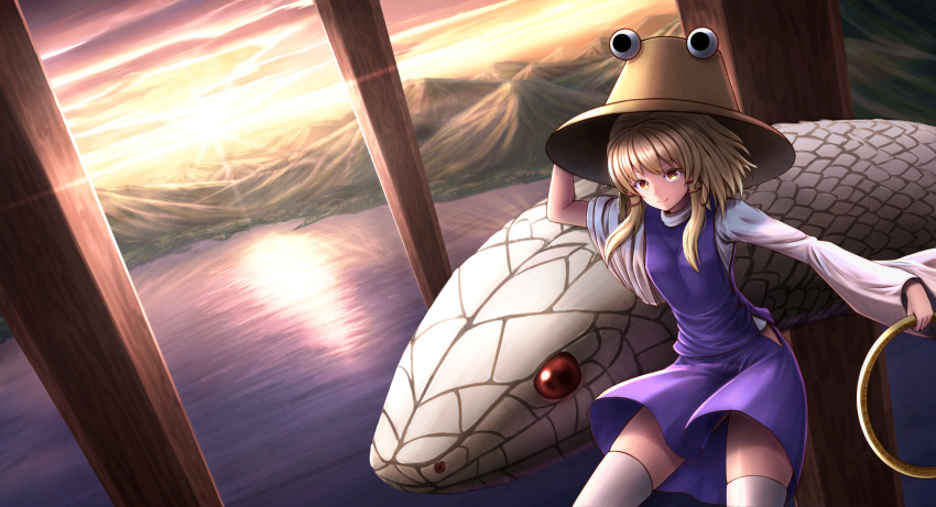 1girl bangs blonde_hair brown_hat brown_ribbon closed_mouth clouds commentary_request diffraction_spikes eyebrows_visible_through_hair hair_ribbon hand_on_headwear hat highres hip_vent holding holding_weapon horizon landscape long_sleeves looking_at_viewer maitake_(maitake1234) mishaguji moriya's_iron_rings moriya_suwako mountain onbashira outstretched_arm purple_skirt purple_vest red_eyes reflection ribbon sidelocks skirt skirt_set sleeves_pushed_up smile snake sun sunlight thigh-highs touhou tress_ribbon twilight vest water weapon white_legwear white_snake wind yellow_eyes
