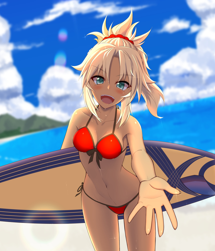 1girl blonde_hair blush breasts cleavage dark_skin eyebrows_visible_through_hair fate/grand_order fate_(series) green_eyes highres holding_surfboard kuroshiro_(ms-2420) looking_at_viewer medium_breasts navel open_mouth red_scrunchie saber_of_red scrunchie short_hair short_ponytail smile solo standing surfboard tan teeth