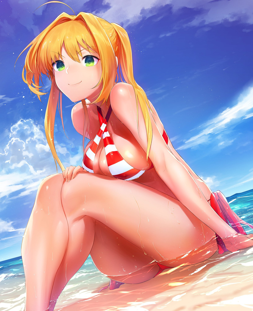1girl ahoge bare_shoulders beach bikini blonde_hair breasts clouds day erect_nipples fate/grand_order fate_(series) green_eyes hair_intakes highres horizon nero_claudius_(swimsuit_caster)_(fate) partially_submerged ryokucha_(i_cobalt) sand side-tie_bikini sitting sky smile striped striped_bikini swimsuit twintails water wet