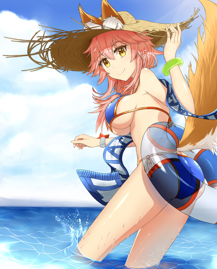 1girl absurdres animal_ears ass bikini blue_bikini blush breasts cleavage drums_(zzszsz2333) ears_through_headwear fate/grand_order fate_(series) fox_ears fox_tail hat highres innertube large_breasts long_hair looking_at_viewer ocean outdoors pink_hair solo straw_hat swimsuit tail tamamo_(fate)_(all) tamamo_no_mae_(swimsuit_lancer)_(fate) under_boob water yellow_eyes