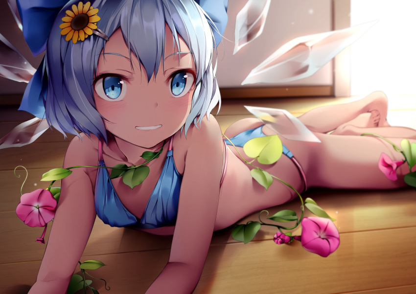 1girl absurdres arm_support ass bare_arms bare_legs barefoot bikini blue_bikini blue_bow blue_eyes blue_hair bow chen_bin cirno collarbone flower hair_flower hair_ornament hairpin hidden_star_in_four_seasons highres ice ice_wings looking_at_viewer lying morning_glory on_floor on_stomach short_hair smile solo summer sunflower sunflower_hair_ornament swimsuit tanned_cirno thong thong_bikini touhou wings wooden_floor