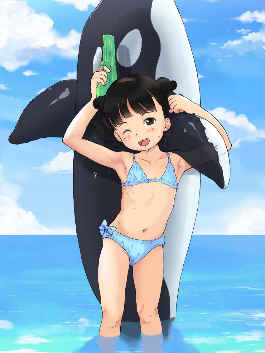 1girl ;d anyannko arm_up armpits bikini black_eyes black_hair blue_bikini blue_sky child clouds commentary day double_bun flat_chest highres inflatable_orca inflatable_toy looking_at_viewer navel one_eye_closed open_mouth original outdoors sky smile solo swimsuit wading water water_drop water_gun