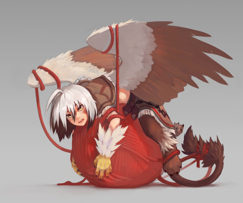 1girl ahoge bangs bird_wings blush brown_fur brown_hair capelet claws full_body grey_background griffon_(monster_girl_encyclopedia) hair_between_eyes highres lion_paw lion_tail looking_at_viewer lying monster_girl multicolored_hair on_stomach open_mouth paintrfiend paws short_hair simple_background solo tail two-tone_hair white_fur white_hair wings yarn_ball yellow_eyes