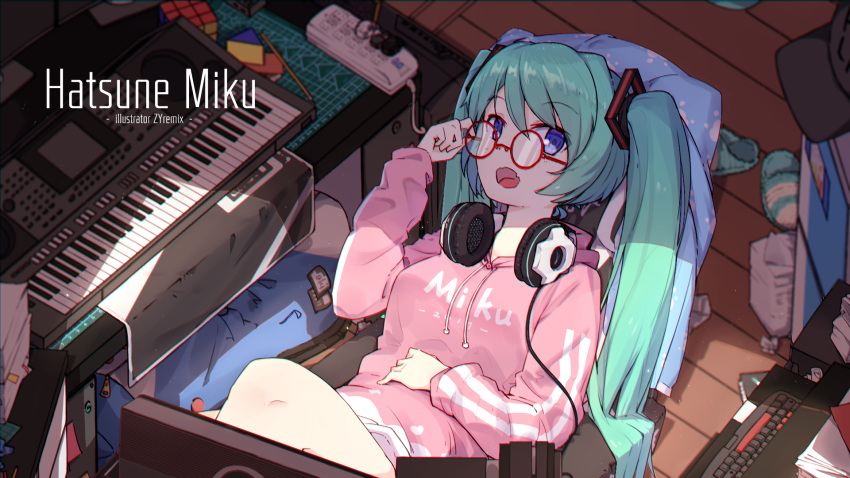 1girl adjusting_glasses aqua_hair artist_name bespectacled blue_eyes character_name computer_keyboard eyebrows_visible_through_hair from_above glasses hatsune_miku headphones headphones_around_neck highres hood hoodie instrument keyboard_(instrument) long_hair looking_at_viewer open_mouth rubik's_cube sitting slippers_removed solo twintails vocaloid zhayin-san