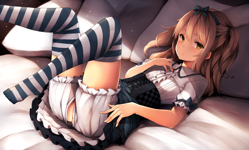 1girl ass bed_sheet black_hairband black_ribbon brown_hair eyebrows_visible_through_hair hair_between_eyes hair_ribbon hairband highres inaba_sunimi long_hair looking_at_viewer lying on_back open_clothes open_shorts original pillow ribbon shirt short_sleeves shorts solo striped striped_legwear thigh-highs white_shirt white_shorts yellow_eyes