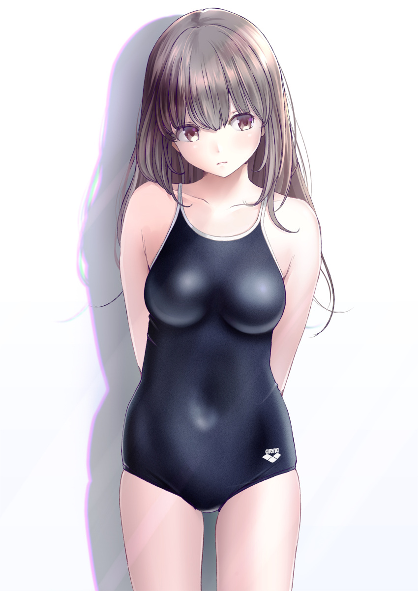 1girl arms_behind_back bangs bare_shoulders black_swimsuit blush breasts brown_eyes brown_hair chikuwa_(odennabe) closed_mouth clothes_writing collarbone competition_school_swimsuit cowboy_shot expressionless highres impossible_clothes impossible_swimsuit legs_apart long_hair looking_at_viewer medium_breasts original shadow simple_background skindentation standing swimsuit tareme thighs white_background
