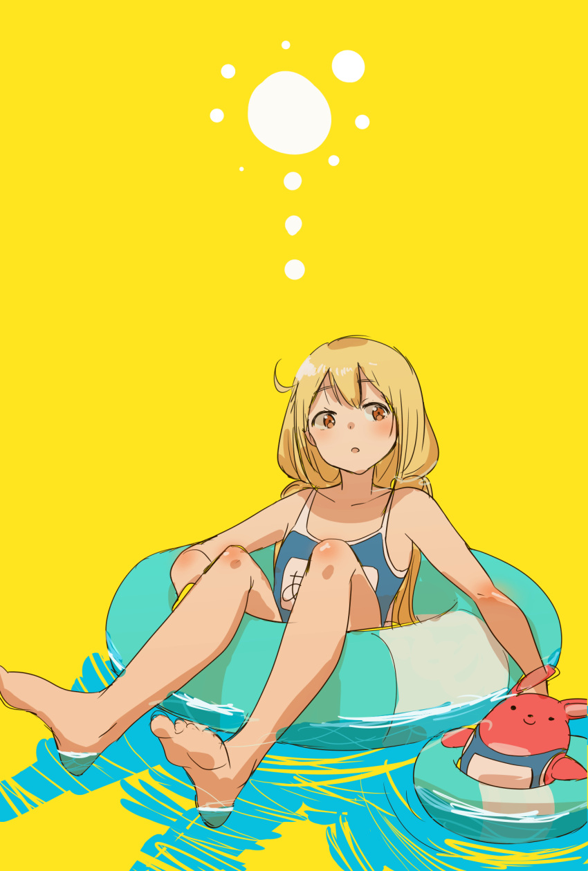 1girl bangs bare_legs barefoot blonde_hair blue_swimsuit blush bouen brown_eyes eyebrows_visible_through_hair floating futaba_anzu highres idolmaster idolmaster_cinderella_girls innertube long_hair looking_at_viewer low_twintails name_tag open_mouth parted_lips school_swimsuit simple_background sitting solo stuffed_animal stuffed_bunny stuffed_toy swimsuit twintails yellow_background