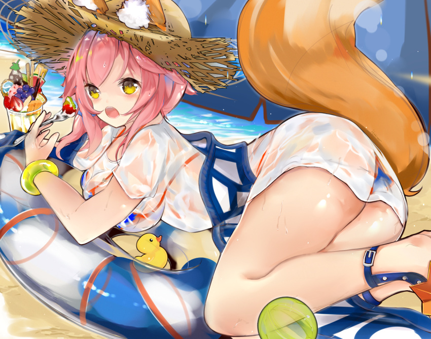 1girl animal_ears beach bikini blue_bikini breasts ears_through_headwear fate/grand_order fate_(series) food fox_ears fox_tail hat innertube itohime large_breasts long_hair looking_at_viewer ocean open_mouth pink_hair rubber_duck solo swimsuit tail tamamo_(fate)_(all) tamamo_no_mae_(swimsuit_lancer)_(fate) wet wet_clothes yellow_eyes