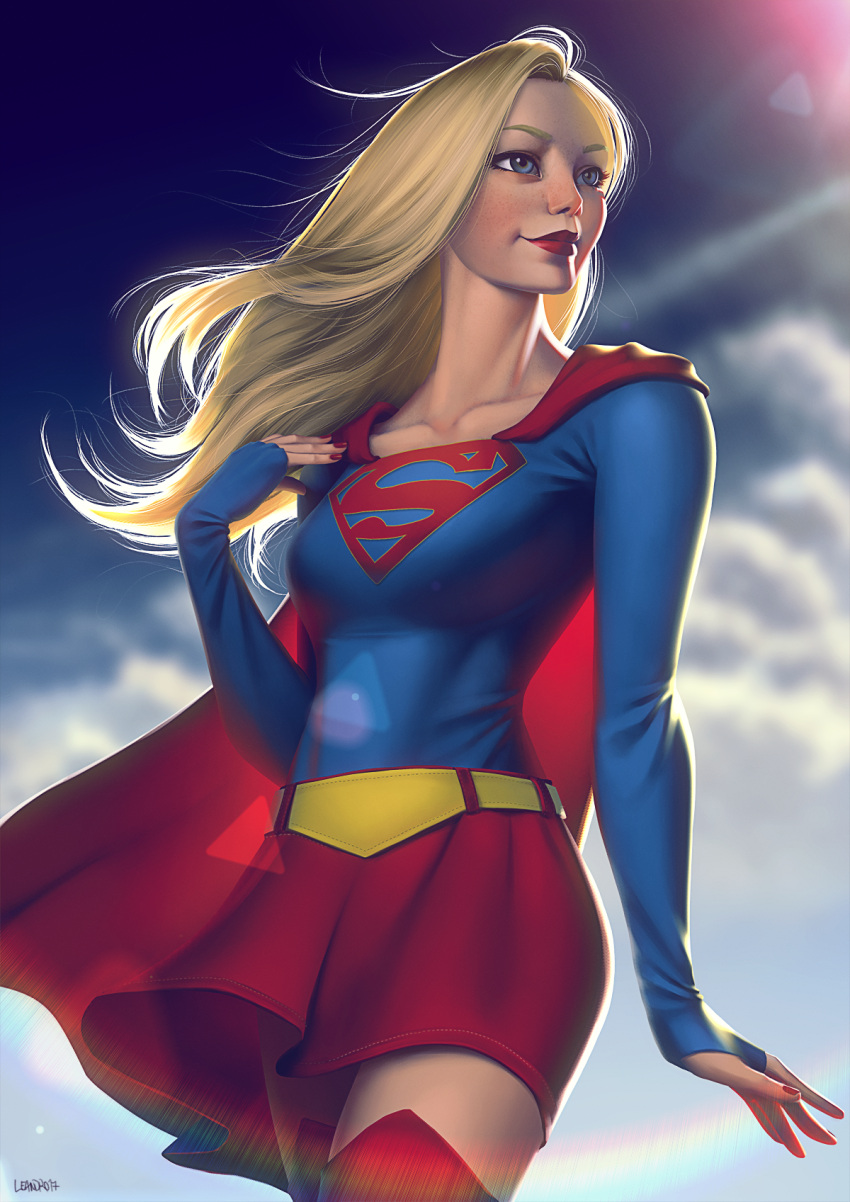 1girl blonde_hair blue_eyes cape collarbone dc_comics emblem freckles highres leandro_franci lipstick makeup nail_polish red_cape red_legwear red_nails red_skirt skirt smile sunlight supergirl superman_(series)