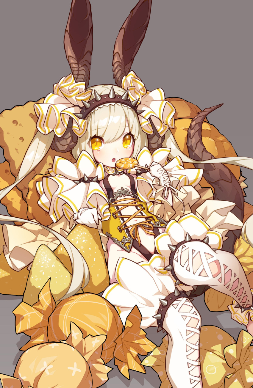 1girl absurdres animal_ears bangs blonde_hair blush breasts bright_pupils candy eyebrows_visible_through_hair feet_out_of_frame food frills gloves grey_background hairband highres holding_lollipop horns kaki_gohri legband lollipop long_hair looking_at_viewer lying on_back orange_eyes original parted_lips simple_background slit_pupils small_breasts solo spiked_hairband spiked_legband spikes tail thigh-highs twintails underbust white_gloves white_legwear