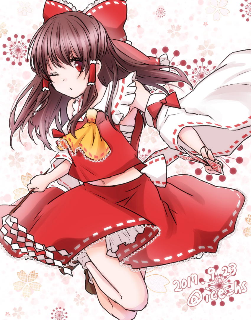 1girl bandage bangs bare_shoulders blush bow brown_hair budget_sarashi dated detached_sleeves eyebrows_visible_through_hair floral_background frilled_bow frilled_shirt_collar frills gohei hair_bow hair_tubes hakurei_reimu highres holding ice_(aitsugai) jumping long_hair long_sleeves looking_at_viewer medium_skirt navel ofuda one_eye_closed petticoat red_bow red_eyes red_skirt red_vest ribbon-trimmed_sleeves ribbon_trim sarashi sidelocks signature skirt socks solo touhou vest white_legwear wide_sleeves yellow_ascot