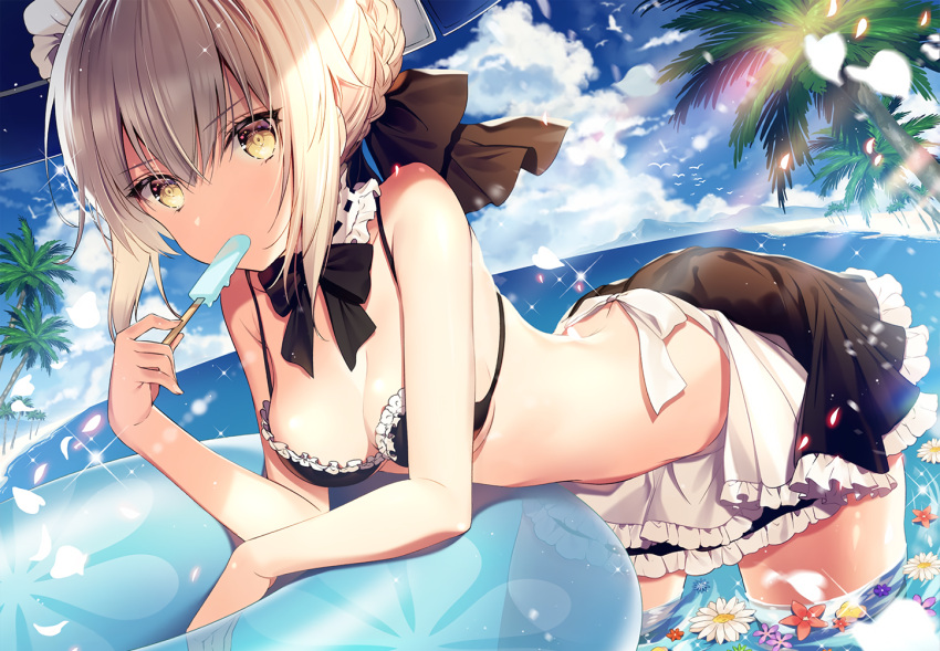 1girl artoria_pendragon_(all) artoria_pendragon_(swimsuit_rider_alter)_(fate) bikini black_bikini blonde_hair blue_sky breasts cleavage clouds day fate/grand_order fate_(series) flower food looking_at_viewer maid_bikini maid_headdress medium_breasts necomi_(gussan) ocean palm_tree partially_submerged petals photoshop popsicle saber_alter short_hair sidelocks signature sky solo swimsuit tree yellow_eyes
