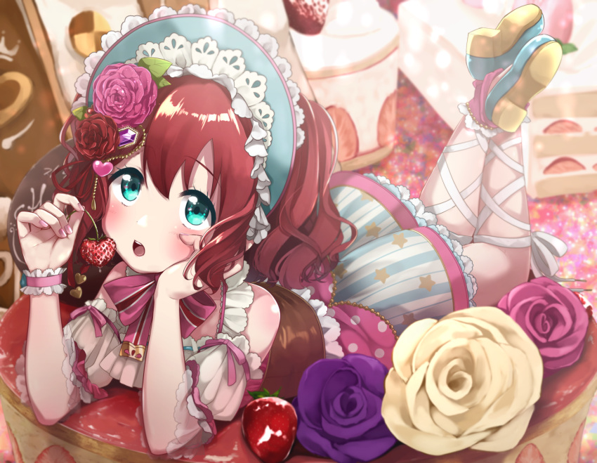 1girl :o ankle_lace-up aqua_eyes bad_feet bangs blush bonnet cake chin_rest commentary_request cross-laced_footwear crossed_ankles detached_sleeves dress feet_up flower food fruit hair_flower hair_ornament hand_on_own_chin heart highres holding holding_fruit kurosawa_ruby lolita_fashion looking_up love_live! love_live!_sunshine!! lying on_stomach open_mouth redhead shoes socks solo strawberry two_side_up wristband yuama_(drop)