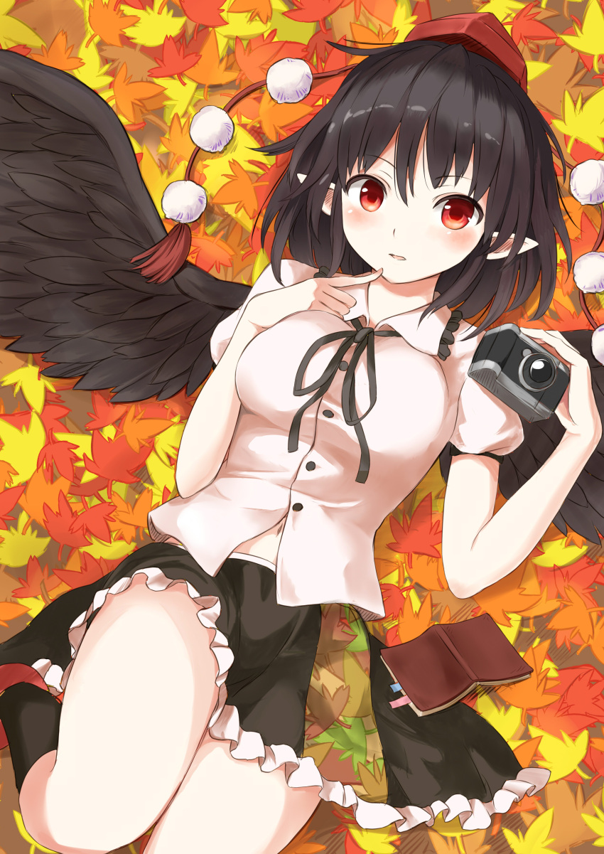 1girl absurdres autumn_leaves black_hair black_legwear black_ribbon black_skirt breasts buttons camera commentary_request finger_to_cheek hat highres large_breasts leaf looking_at_viewer lying miniskirt navel neck_ribbon notebook on_back pointy_ears pom_pom_(clothes) red_eyes red_footwear ribbon shameimaru_aya shoes skirt socks solo tassel techi_(techi35499) tokin_hat touhou wing_collar