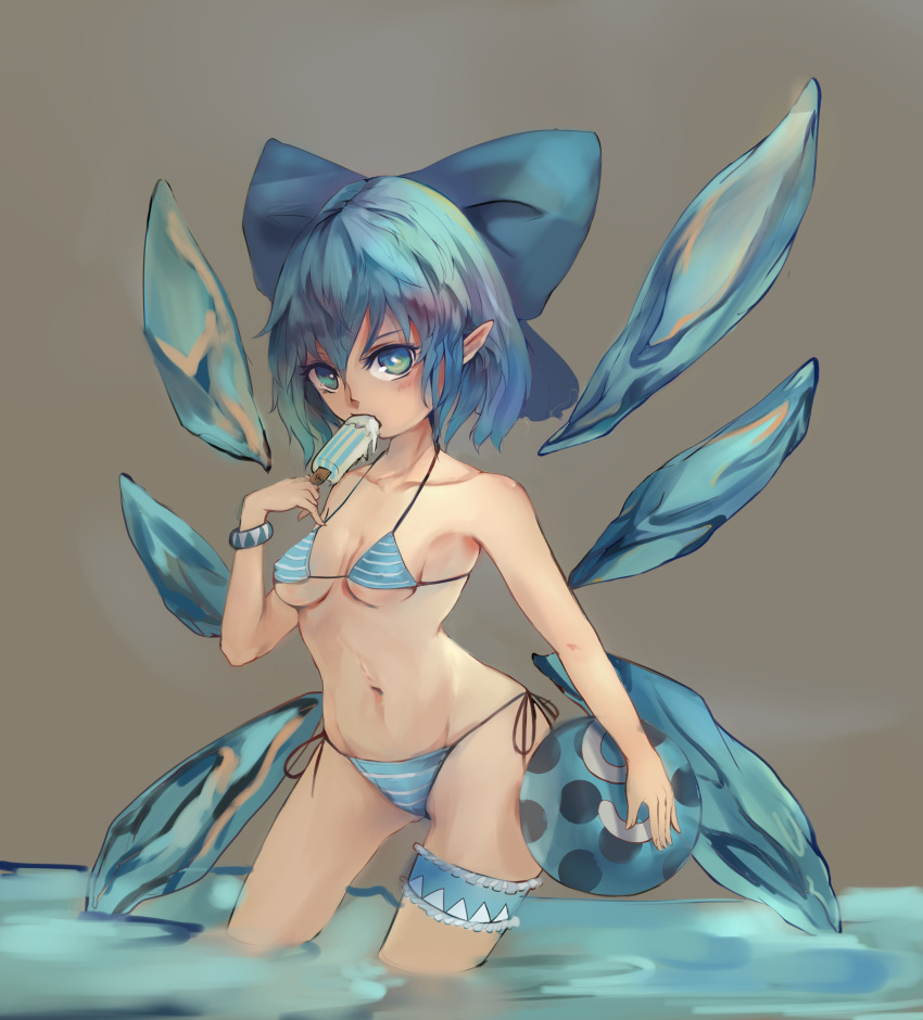 1girl absurdres ball beachball bikini blue_bikini blue_bow blue_hair bow bracelet cirno dada_(pixiv7594450) eating food grey_background groin highres jewelry looking_at_viewer navel pointy_ears popsicle solo standing striped striped_bikini swimsuit thigh_strap touhou wading water wings