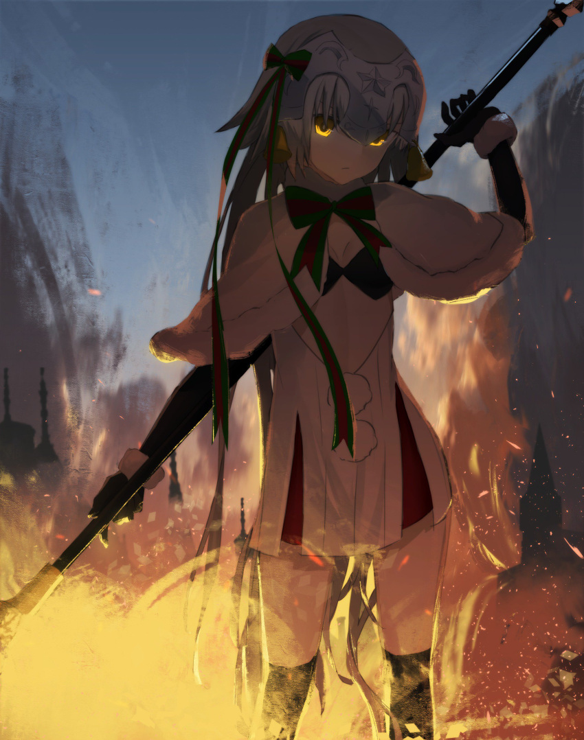 1girl absurdres asuteroid bangs bell black_gloves black_legwear bow capelet closed_mouth commentary cowboy_shot fate/grand_order fate_(series) fire fur_trim gloves green_ribbon hair_ribbon headpiece highres holding holding_spear holding_weapon jeanne_d'arc_(fate)_(all) jeanne_d'arc_alter_santa_lily long_hair looking_at_viewer polearm ribbon shadowed solo spear standing striped striped_bow striped_ribbon weapon yellow_eyes