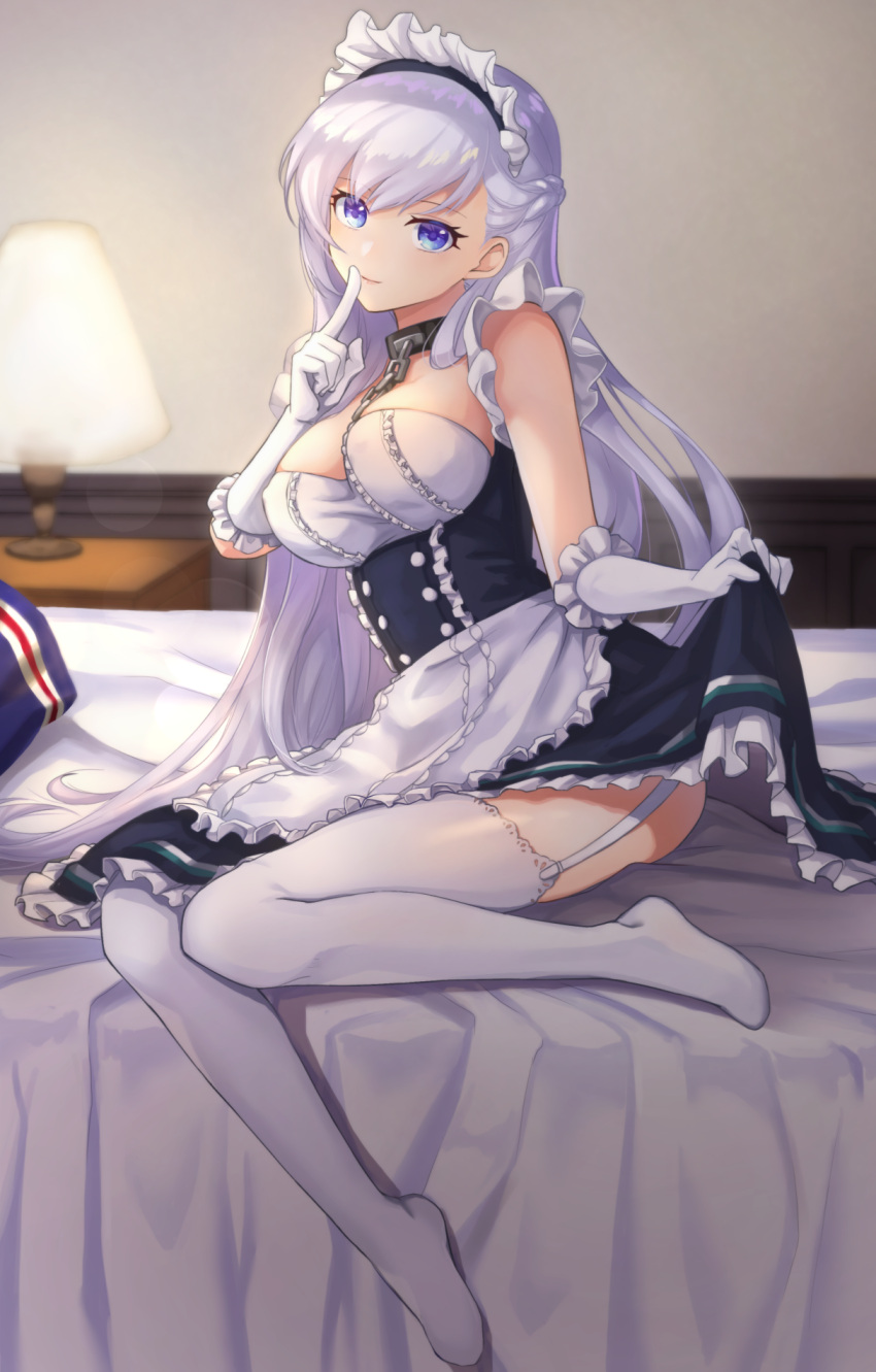 1girl apron azur_lane bed bed_sheet belfast_(azur_lane) blue_eyes blurry braid breasts chains cleavage collar commentary_request depth_of_field desk_lamp dress dress_lift elbow_gloves french_braid garter_straps gloves head_tilt highres index_finger_raised kon_(k0n16) lamp lifted_by_self long_hair looking_at_viewer maid maid_apron maid_headdress silver_hair sitting smile solo white_gloves white_legwear