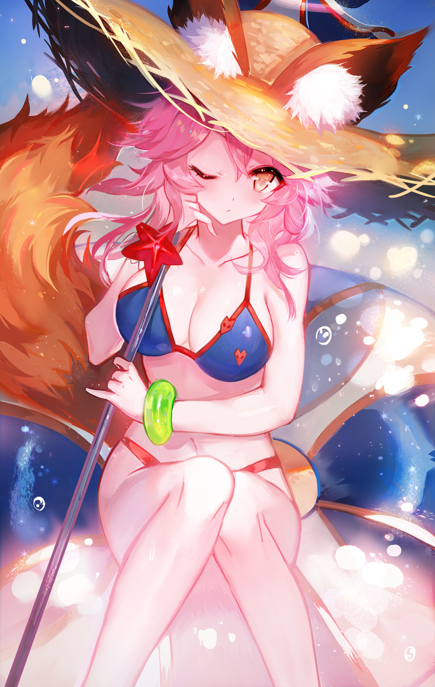 1girl animal_ears bangs beach_umbrella bikini blue_bikini blush breasts closed_mouth collarbone commentary_request fate/grand_order fate_(series) fox_ears fox_print fox_tail hair_between_eyes hat highres holding holding_umbrella innertube knees_up large_breasts long_hair looking_at_viewer moemoe3345 navel one_eye_closed pink_hair revision sitting solo sun_hat swimsuit tail tamamo_(fate)_(all) tamamo_no_mae_(fate) tamamo_no_mae_(swimsuit_lancer)_(fate) umbrella yellow_eyes