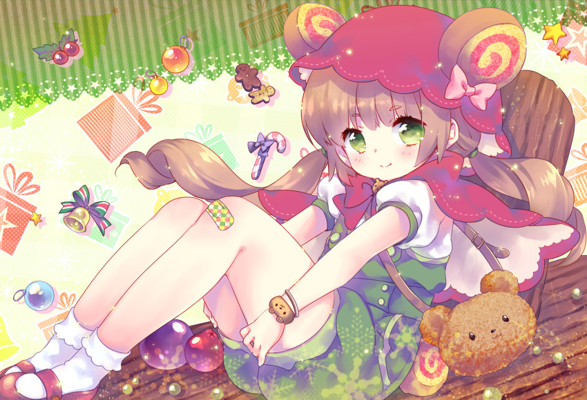 1girl animal_bag bag bandaid bandaid_on_knee bangs bear_bag bell blush bobby_socks box bracelet brown_hair candy candy_cane christmas christmas_ornaments closed_mouth ech eyebrows_visible_through_hair food gift gift_box gingerbread_man green_eyes hat highres jewelry long_hair looking_at_viewer low_twintails mary_janes original overalls puffy_short_sleeves puffy_sleeves red_footwear red_hat ribbon shirt shoes short_sleeves shoulder_bag sitting smile socks solo star striped striped_ribbon twintails white_legwear white_shirt