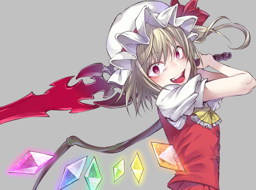 1girl ascot bangs blonde_hair fang flandre_scarlet grey_background hands_up hat hat_ribbon highres holding holding_sword holding_weapon laevatein long_hair looking_at_viewer mob_cap open_mouth red_eyes red_ribbon ribbon shiori_(moechin) short_sleeves simple_background smile solo sword teeth touhou upper_body vest weapon white_hat wings yellow_neckwear
