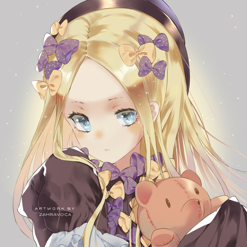 1girl abigail_williams_(fate/grand_order) artist_name bangs black_dress black_hat blonde_hair bloomers blue_eyes blush bow closed_mouth commentary_request dress fate/grand_order fate_(series) hair_bow hands_in_sleeves hat head_tilt highres long_sleeves looking_at_viewer object_hug orange_bow parted_bangs polka_dot polka_dot_bow purple_bow solo stuffed_animal stuffed_toy teddy_bear underwear zahravoca_(annpratamav)