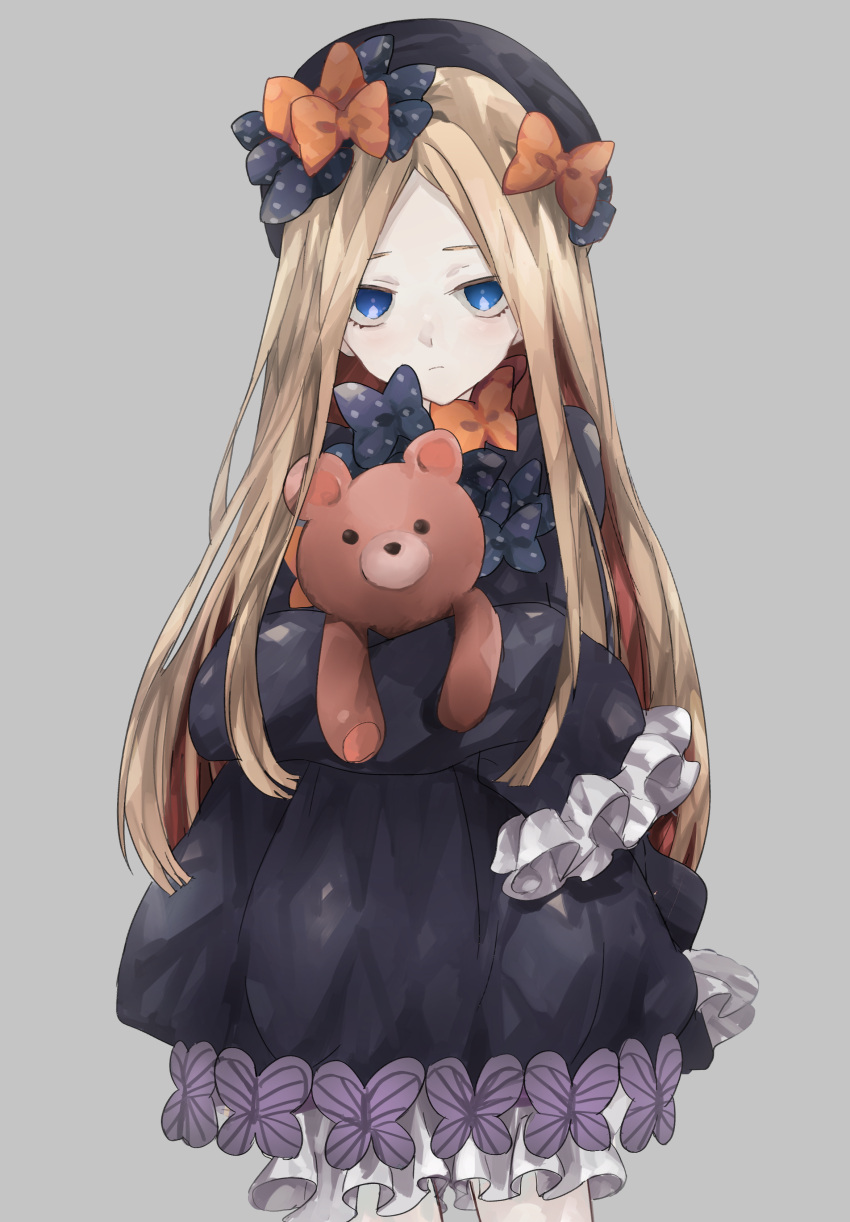 1girl abigail_williams_(fate/grand_order) absurdres bangs black_bow black_dress black_hat blonde_hair bloomers blue_eyes bow butterfly closed_mouth commentary_request cowboy_shot dress fate/grand_order fate_(series) grey_background hair_bow hands_in_sleeves hat head_tilt highres long_sleeves looking_at_viewer object_hug orange_bow parted_bangs polka_dot polka_dot_bow shirone_(shiromame-0111) solo stuffed_animal stuffed_toy teddy_bear underwear white_bloomers