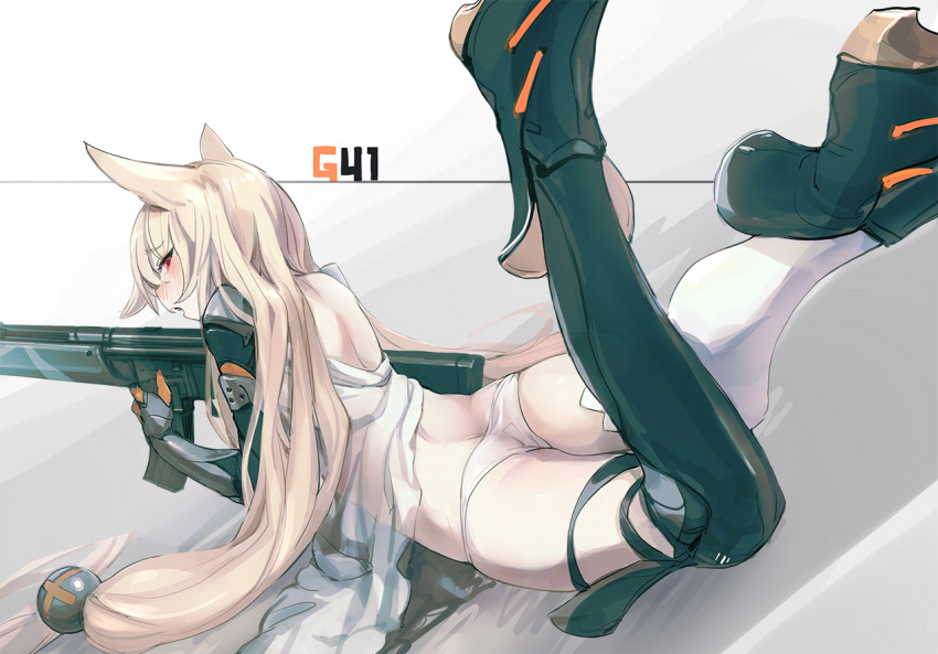 1girl ass bangs bee_(deadflow) blonde_hair blush butt_crack character_name dutch_angle eyebrows_visible_through_hair flat_ass from_behind g41_(girls_frontline) girls_frontline gun h&amp;k_g41 hair_bobbles hair_ornament holding holding_gun holding_weapon long_hair looking_at_viewer looking_back lying mechanical_arms on_stomach open_mouth panties red_eyes rifle sidelocks single_thighhigh solo thigh-highs thighs tsurime underwear very_long_hair weapon white_legwear white_panties