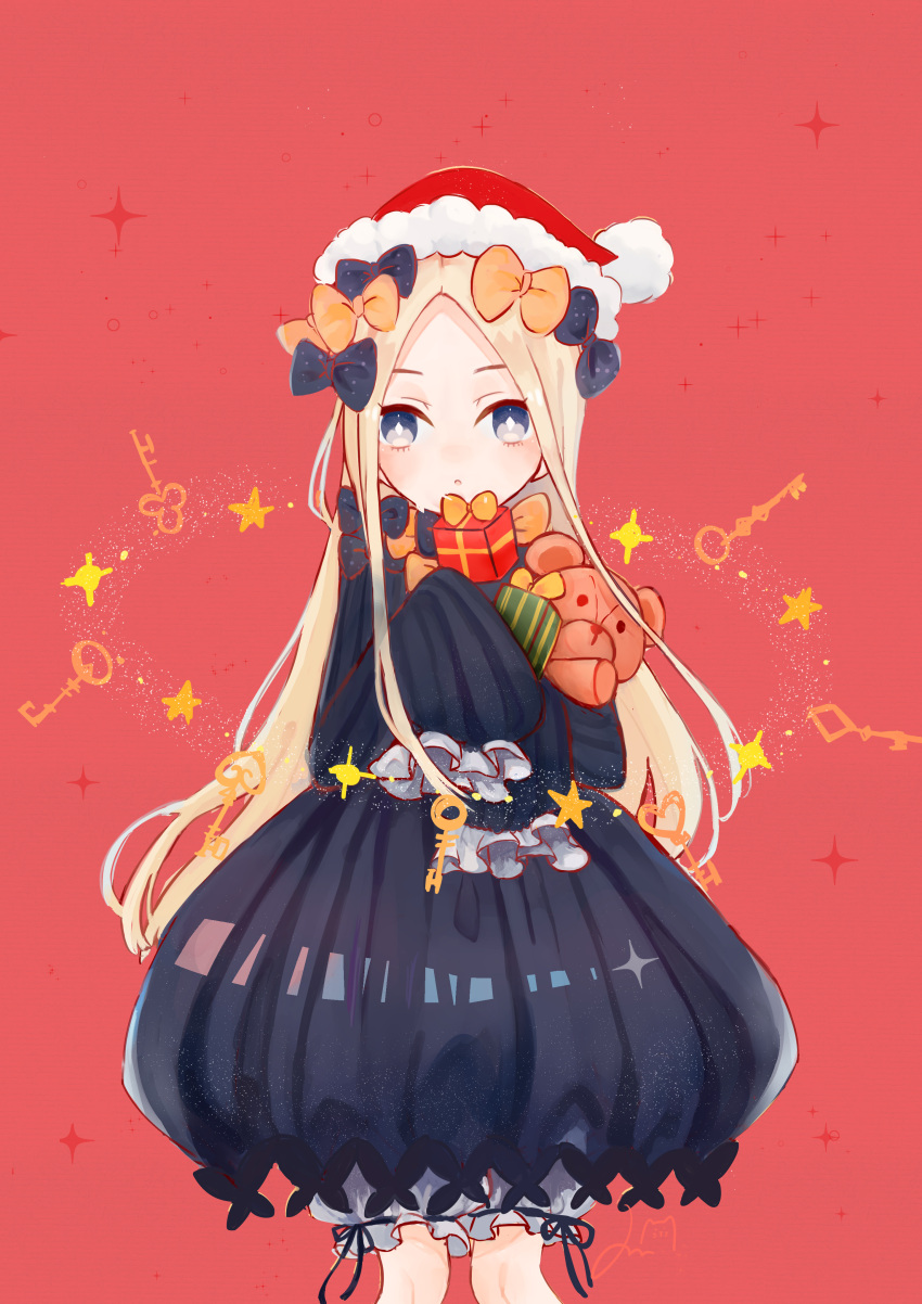 1girl :o abigail_williams_(fate/grand_order) absurdres alternate_headwear bangs black_bow black_dress blonde_hair bloomers blue_eyes bow box butterfly commentary_request dress fate/grand_order fate_(series) forehead gift gift_box hair_bow hat highres key long_hair long_sleeves looking_at_viewer object_hug orange_bow parted_bangs parted_lips polka_dot polka_dot_bow red_background red_hat relk santa_hat sleeves_past_wrists solo sparkle star stuffed_animal stuffed_toy teddy_bear underwear very_long_hair white_bloomers