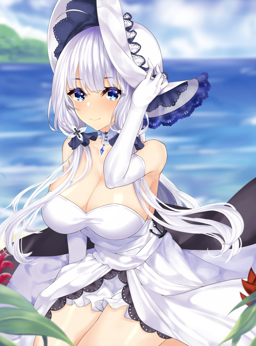1girl anchor azur_lane bangs beach blue_eyes blush breasts choker cleavage day dress elbow_gloves error_dot eyebrows_visible_through_hair gloves hair_ornament hair_over_shoulder hand_on_headwear hat highres illustrious_(azur_lane) lace-trimmed_hat large_breasts long_hair looking_at_viewer low_twintails mole mole_under_eye ocean outdoors sitting smile solo strapless strapless_dress twintails white_dress white_gloves white_hair wind