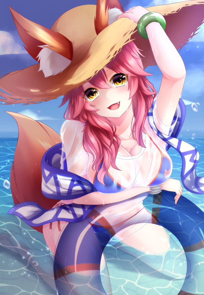 1girl animal_ears bikini blue_bikini bracelet breasts collarbone day ears_through_headwear fang fate/extra fate/grand_order fate_(series) fox_ears fox_tail hair_between_eyes hand_on_headwear hat highres innertube jewelry kneeling large_breasts nya_rl ocean open_mouth outdoors partially_submerged pink_hair shirt side-tie_bikini sky smile straw_hat sun_hat swimsuit t-shirt tail tamamo_(fate)_(all) tamamo_no_mae_(swimsuit_lancer)_(fate) water wet wet_clothes wet_shirt wet_t-shirt yellow_eyes