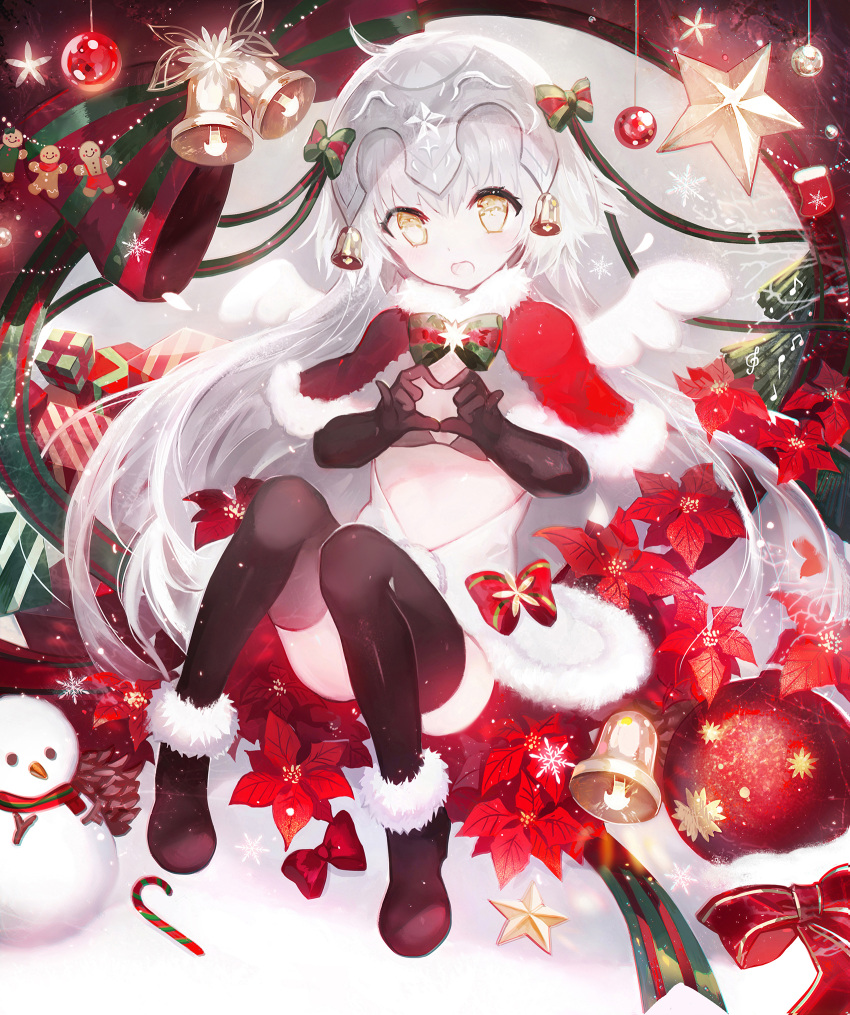 1girl bell black_bikini_top black_gloves black_legwear blush bow box candy candy_cane capelet christmas christmas_ornaments elbow_gloves fate/grand_order fate_(series) food fur_trim gift gift_box gingerbread_man gloves green_ribbon hair_ribbon headpiece heart heart_hands highres jeanne_d'arc_(fate)_(all) jeanne_d'arc_alter_santa_lily long_hair looking_at_viewer moemoe3345 open_mouth ribbon snowman solo striped striped_bow striped_ribbon thigh-highs wings yellow_eyes