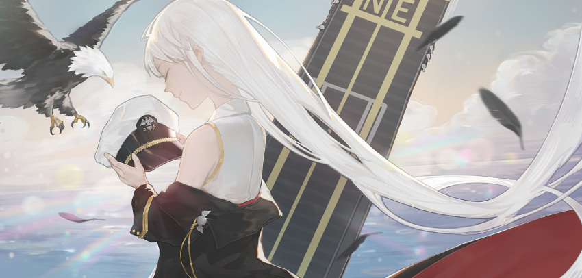 1girl azur_lane black_feathers clouds enterprise_(azur_lane) feathers from_behind hat highres holding holding_hat kirikiri long_hair military_jacket morning ocean off_shoulder outdoors peaked_cap sleeveless smile solo very_long_hair