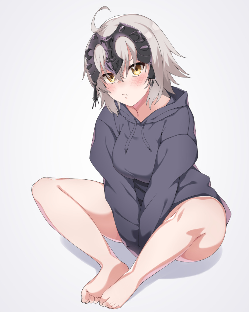1girl ahoge bangs bare_legs barefoot between_legs blush breasts closed_mouth commentary_request eyebrows_visible_through_hair eyes_visible_through_hair fate/grand_order fate_(series) feet feet_together full_body grey_background grey_sweater hand_between_legs highres hood hood_down hooded_sweater jeanne_d'arc_(alter)_(fate) jeanne_d'arc_(fate)_(all) long_sleeves looking_at_viewer medium_breasts pout shadow short_hair silver_hair simple_background solo spicy_moo sweater yellow_eyes