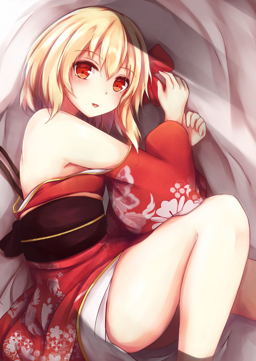 1girl bangs bare_legs bare_shoulders blonde_hair fang flandre_scarlet floral_print hair_ribbon highres japanese_clothes kashiwagi_yamine kimono looking_at_viewer lying obi off_shoulder on_side open_mouth red_eyes red_kimono ribbon sash smile solo touhou wide_sleeves wings
