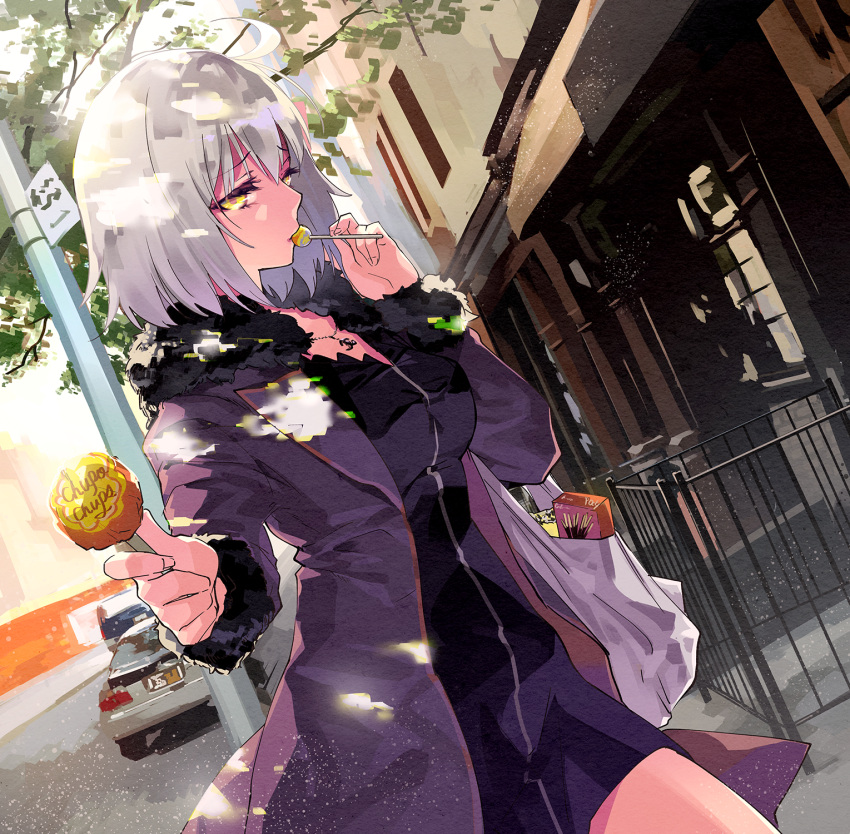 1girl bag breasts candy fate/grand_order fate_(series) food fur-trimmed_jacket fur_trim highres jacket jeanne_d'arc_(alter)_(fate) jeanne_d'arc_(fate)_(all) lollipop looking_at_viewer medium_breasts plastic_bag pocky solo tsurukame yellow_eyes