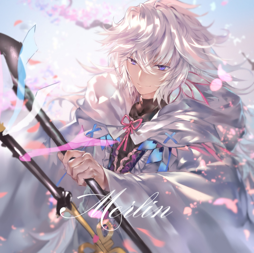 1boy avamone black_shirt blue_eyes blue_sky character_name cherry_blossoms closed_mouth day eyebrows_visible_through_hair fate_(series) hair_between_eyes highres holding hood hood_down long_hair male_focus merlin_(fate/stay_night) messy_hair outdoors robe shirt sky smile solo staff