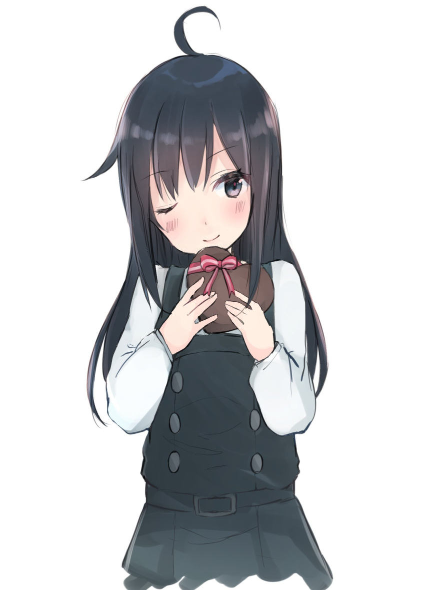 ;) ahoge asashio_(kantai_collection) belt black_hair blue_eyes blush chocolate commentary dress eyebrows_visible_through_hair heart-shaped_box highres kantai_collection kayuma long_hair long_sleeves looking_at_viewer one_eye_closed pinafore_dress remodel_(kantai_collection) shirt simple_background smile upper_body valentine white_background white_shirt