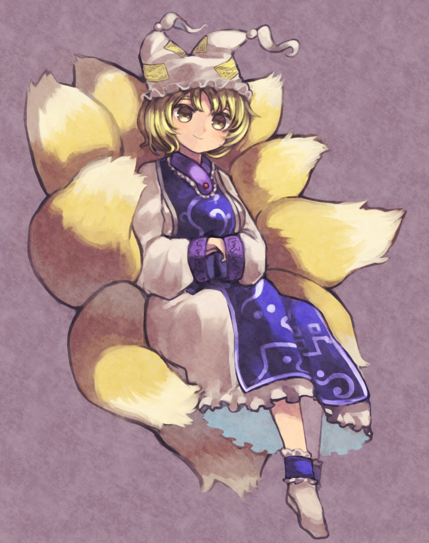 1girl animal_ears blonde_hair blush closed_mouth commentary_request fox_ears fox_tail hands_in_sleeves hat highres pillow_hat sasa_kichi shirt sitting skirt smile socks solo tail touhou white_legwear white_shirt white_skirt wide_sleeves yakumo_ran yellow_eyes