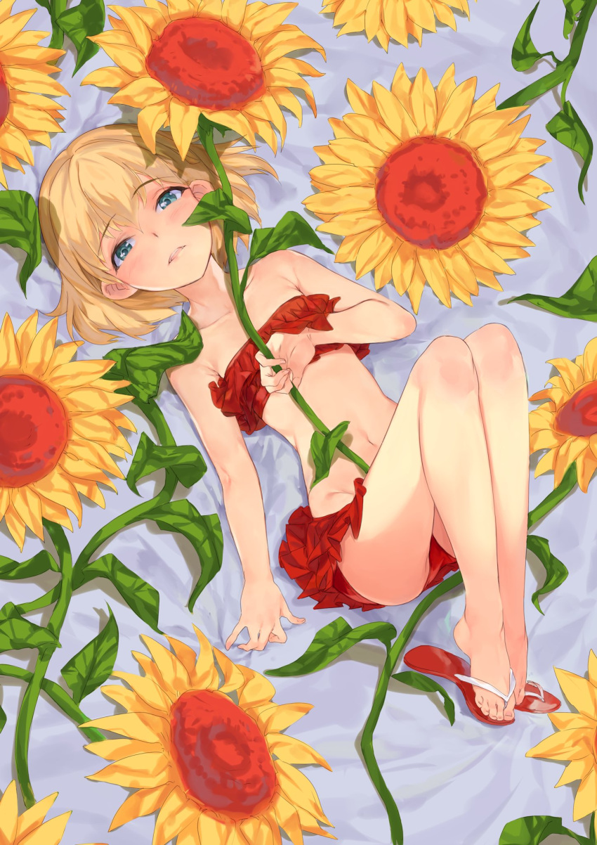 1girl bangs bikini blonde_hair blue_eyes commentary eyebrows_visible_through_hair flower from_above full_body girls_und_panzer half-closed_eyes highres holding holding_flower kabotya_to_rantan katyusha legs_up looking_at_viewer lying navel on_back parted_lips red_bikini red_footwear sandals short_hair solo sunflower swimsuit