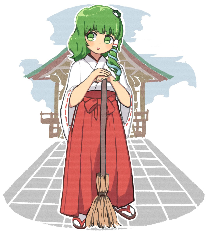 1girl :d blush broom commentary_request frog_hair_ornament full_body green_eyes green_hair hair_ornament hakama highres japanese_clothes kochiya_sanae long_sleeves looking_at_viewer miko open_mouth outdoors red_skirt sandals sasa_kichi shrine skirt smile snake_hair_ornament solo standing tabi touhou white_legwear wide_sleeves