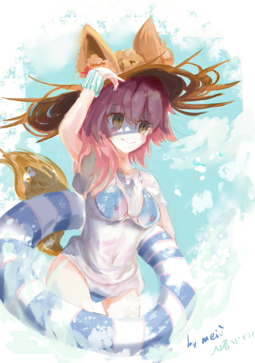 1girl animal_ears bikini bikini_under_clothes blue_bikini breasts cleavage commentary_request ears_through_headwear fate/grand_order fate_(series) fox_ears fox_tail hat highres innertube large_breasts meii0526 pink_hair see-through shirt side-tie_bikini solo straw_hat swimsuit swimsuit_under_clothes tail tamamo_(fate)_(all) tamamo_no_mae_(swimsuit_lancer)_(fate) twitter_username wet wet_clothes wet_shirt wet_t-shirt yellow_eyes