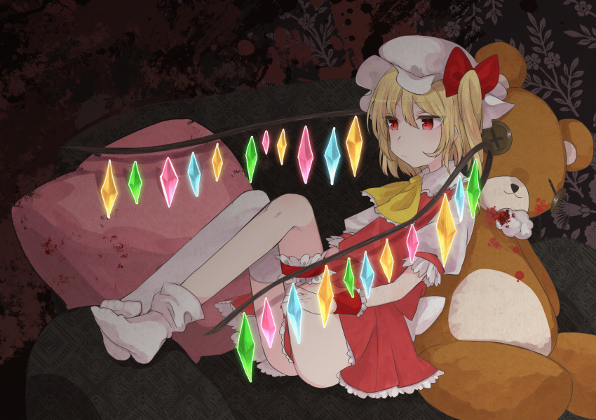 1girl ascot blonde_hair blood blood_splatter bow button_eyes buttons commentary_request crystal flandre_scarlet frilled_skirt frilled_sleeves frills garters hair_bow hat highres leaning_back leaning_on_object mob_cap one_side_up pillow red_bow red_eyes red_skirt sakechazuke short_sleeves single_thighhigh skirt skirt_set socks solo stuffed_animal stuffed_toy teddy_bear thigh-highs touhou white_legwear wings wrist_cuffs yellow_neckwear
