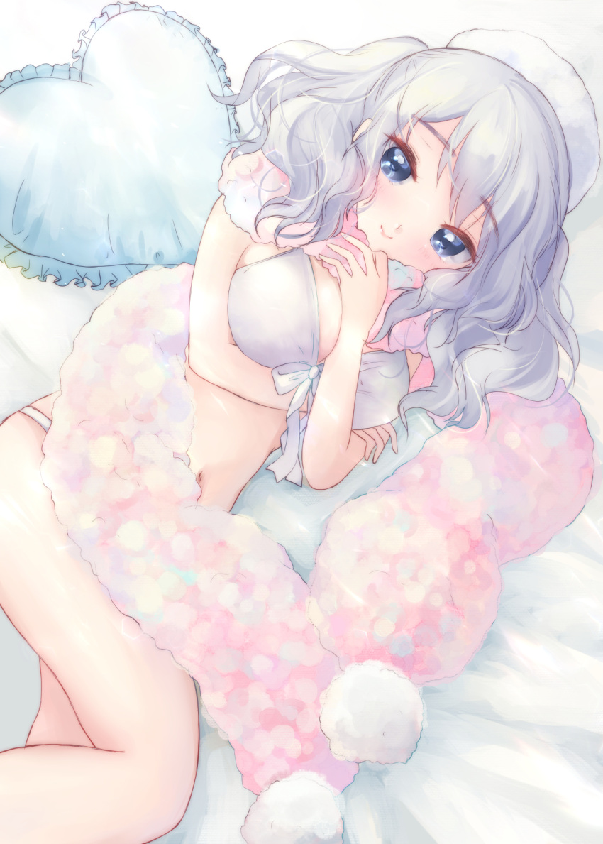 1girl bangs bare_arms bare_hips bare_legs bed beret between_breasts blue_eyes blush breasts bunapi_(bunapii) closed_mouth commentary_request dutch_angle eyebrows eyebrows_visible_through_hair front-tie_top hair_between_eyes hand_between_breasts hat heart heart_pillow highres kantai_collection kashima_(kantai_collection) large_breasts long_hair looking_at_viewer lying on_bed on_side pillow pom_pom_(clothes) scarf sidelocks silver_hair smile solo swimsuit tsurime twintails wavy_hair white_background white_hat white_swimsuit