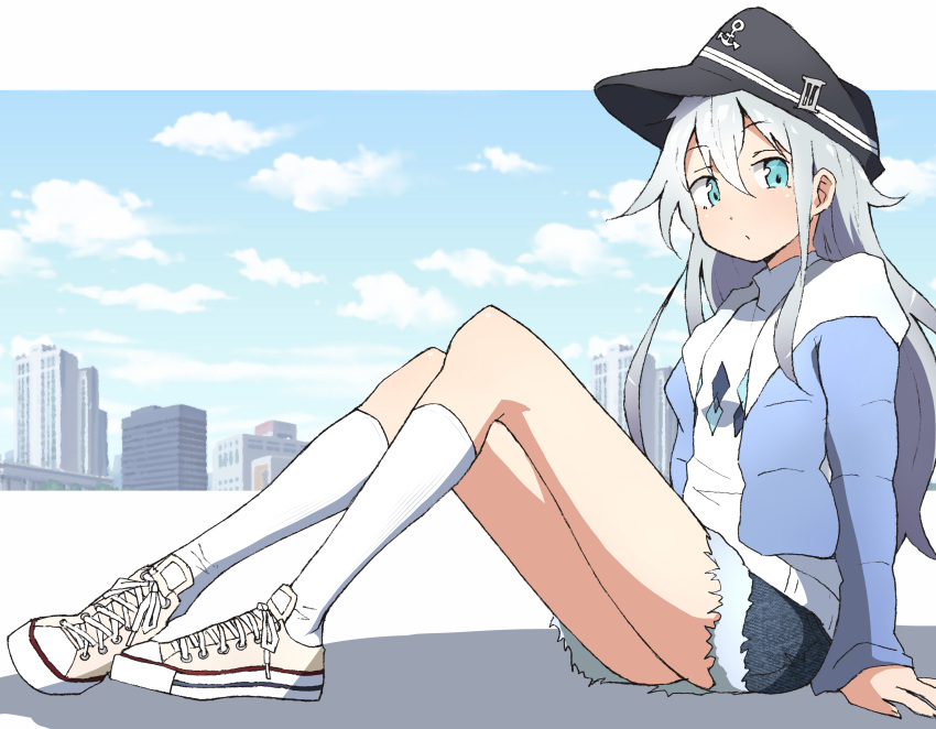 1girl absurdres alternate_costume blue_eyes blue_hat blue_jacket cityscape denim denim_shorts flat_cap full_body hat hibiki_(kantai_collection) highres jacket kantai_collection kneehighs long_hair looking_at_viewer nel-c shoes shorts silver_hair sitting sneakers solo sweater white_footwear white_legwear white_sweater