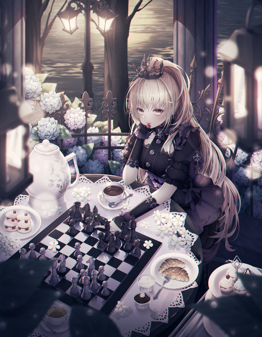 1girl absurdres bangs black_dress black_gloves blurry blush board_game breasts brown_eyes cecil86 cherry chess chessboard cuffs cup depth_of_field dress fingerless_gloves flower food fruit gloves hand_on_own_cheek highres hydrangea lantern leaf light_brown_hair long_hair looking_at_viewer medium_breasts mouth_hold original plate sitting solo table teacup teapot tiara water